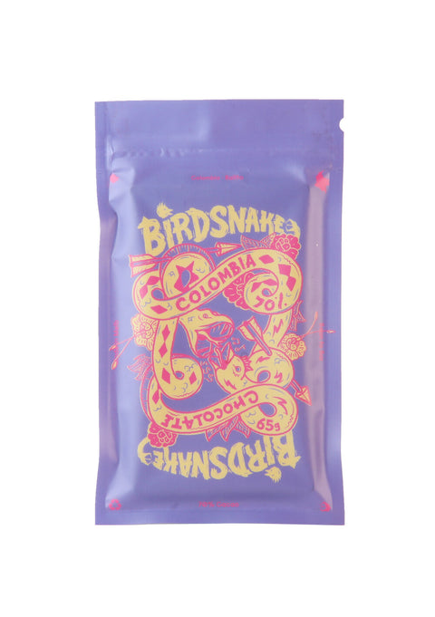 Rectangular purple and yellow pouch containing birdsnake chocolate from Colombia.